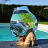 Aquarium ou bol à punch en verre recyclé fondu puis soufflé en fusion sur une racine, le verre est amovible.