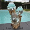 Trois vases en verre recyclé soufflé en fusion directement sur du bois flotté, les verres sont amovibles.