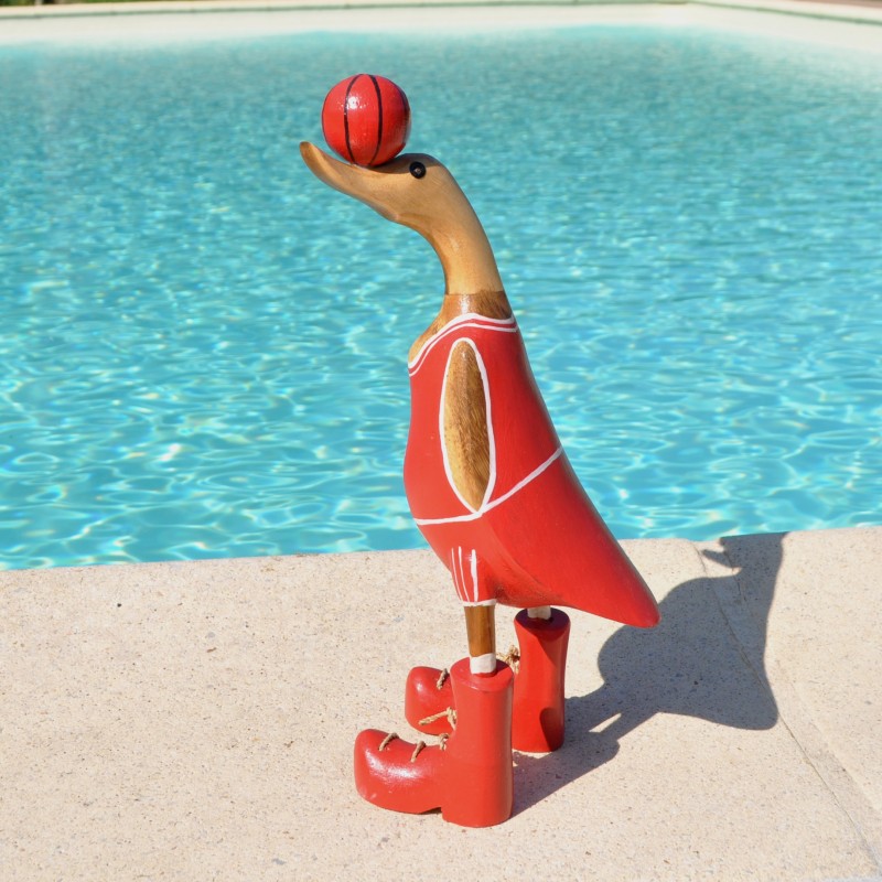 Canard en bois en joueur de basket
