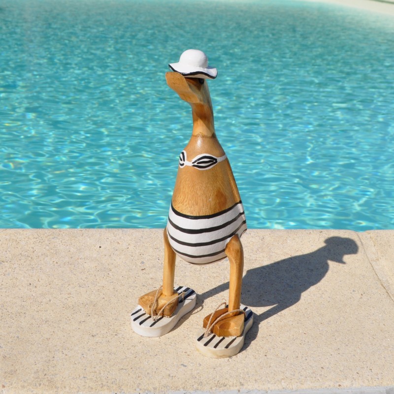 Canard humoristique sculptés sur du bois