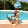 Deux aquariums en verre recyclé soufflé en fusion directement sur du bois flotté, les verres sont amovibles