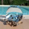 Verre recyclé soufflé et moulé en fusion sur du bois flotté de teck