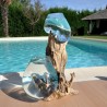 Deux aquariums en verre recyclé soufflé en fusion directement sur du bois flotté, les verres sont amovibles