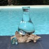 Verre recyclé soufflé et moulé sur du bois flotté