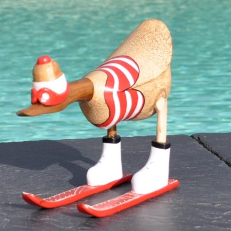 Un canard en bois de teck et racine de bambou en trazin de faire du schuss en ski
