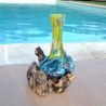 Soliflore en verre recyclé  soufflé en fusion sur du bois flotté et le verre se sort pour le lavage