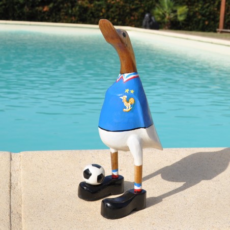 Un canard en bois en joueur de foot de l'Equipe de France