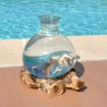 Verre recyclé soufflé et moulé sur du bois flotté